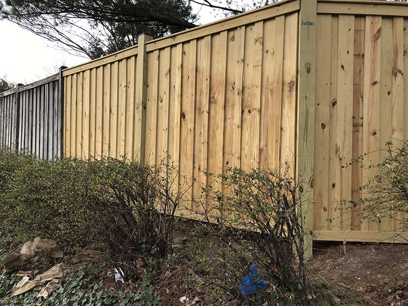 Fence in Alexandria VA looking great after pressure washing graffiti off